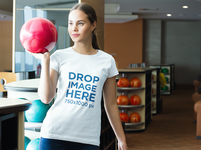 T-Shirt Mockup Featuring a Girl at a Bowling Center digital marketing mockup generator mockup template mockup tools stock photo mockup stock photo template t shirt mockup t shirt mockup generator t shirt mockup template t shirt template visual marketing campaign web marketing