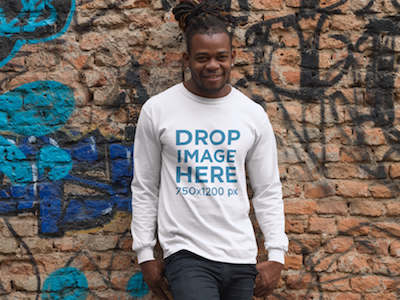 Long Sleeve T-Shirt Mockup of a Guy Leaning Against a Wall