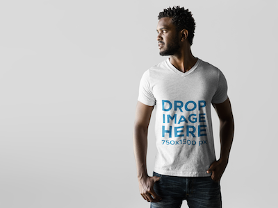 T-Shirt Mockup Featuring a Male Model in a Photoshoot