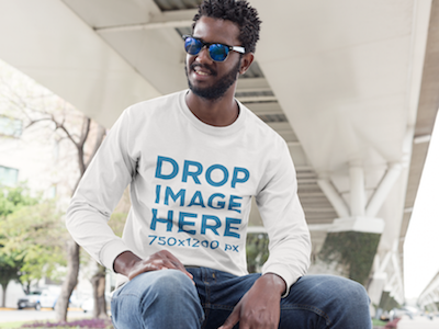 Long Sleeve T-Shirt Mockup of a Man Sitting on a Bench