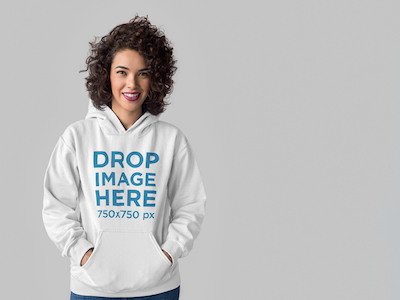 Hoodie Mockup of a Curly-Haired Woman at a Photo Studio clothing mockup clothing template hoodie mockup hoodie mockup generator hoodie mockup template hoodie stock photo hoodie template mockup generator mockup template mockup tools visual marketing tools
