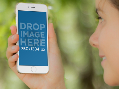 iPhone Mockup of a Girl Hiking in the Woods image marketing iphone iphone mockup iphone mockup template iphone stock photo iphone template mockup template mockup template generator tool photorealistic mockup