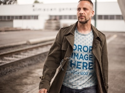 T-Shirt Mockup of a Handsome Man at a Construction Site