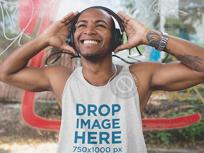 Black Man Wearing a Tank Top and Headphones in the Street apparel clothing clothing brand clothing mockups marketing mockups t shirt tank top tank top mockup