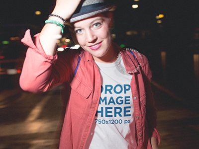Mockup of a Stylish Woman Wearing a Tee and Hat Out at Night apparel branding clothing clothing mockups marketing mockup t shirt tshirt tshirt mockup