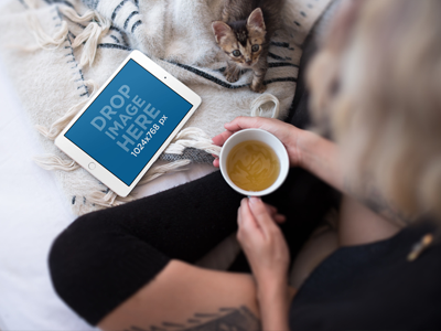 iPad Mockup of a Young Woman Having a Cup of Tea With Her Kitten app marketing ios apps ipad ipad mockups mockup template mockups uiux