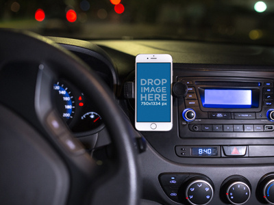 Mockup of a White iPhone Mounted on a Car Dashboard