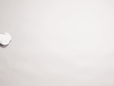 Stop Motion Video Mockup of a Bouncing Tee Over a White Surface