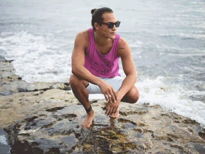 Surfer Guy Wearing a Tank Top Mockup and Sunglasses at the Beach advertising apparel beach apparel branding clothing brand clothing line mockups tank top tank top mockup