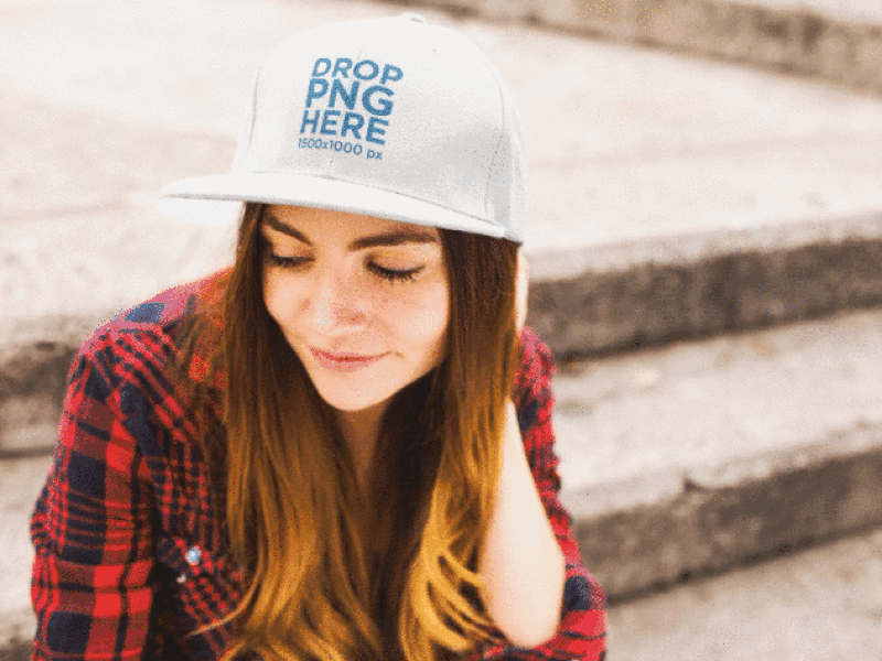 Video of a Girl Wearing a Hat and at a Concrete Staircase apparel apparel mockup apparel video hat hat mockup hat video stop motion video mockup