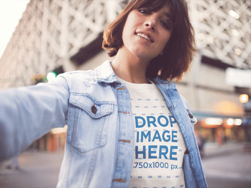 Selfie Mockup of Girl Wearing a T-shirt and a Denim Jacket apparel apparel mockup design selfie mockup t shirt t shit mockup tee template