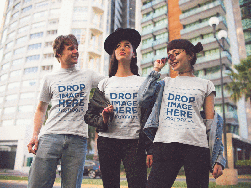 Three Friends Hanging out in the City Wearing a T-shirt Mockup apparel apparel mockup design group mockup t shirt t shit mockup tee template