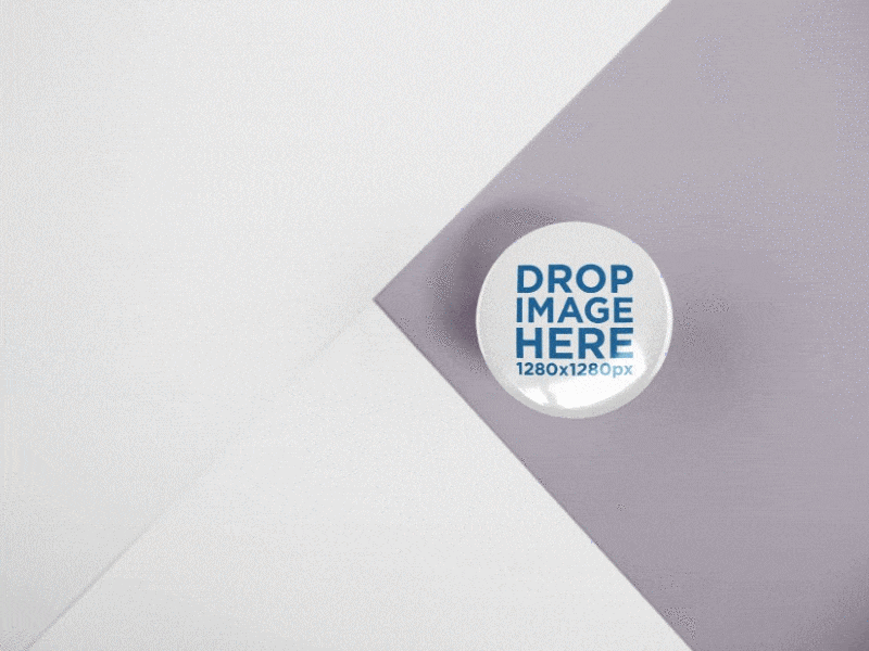 Small Button Mockup Lying on a Flat Surface Made of Three Colors