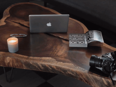 Frontal MacBook Video Mockup Lying on a Modern Wooden Desk