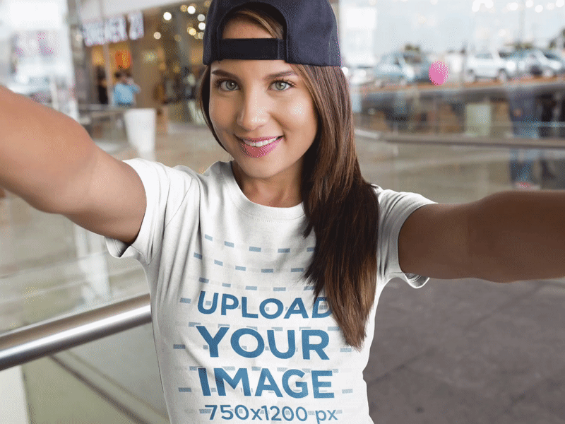 Selfie of a Girl Wearing a Hat and a T-Shirt Mockup apparel apparel mockup design graphic t shirt selfie mockup t shirt t shirt design t shirt mockup t shirt mockup generator tee template