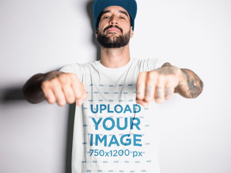 Download Tattooed Man Wearing A T Shirt Mockup While Showing His Knuckles By Placeit On Dribbble