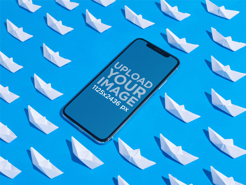 Iphone X Mockup On A Blue Surface Surrounded By Paper Boats design template digital marketing iphone iphone mockup iphone x ui ux