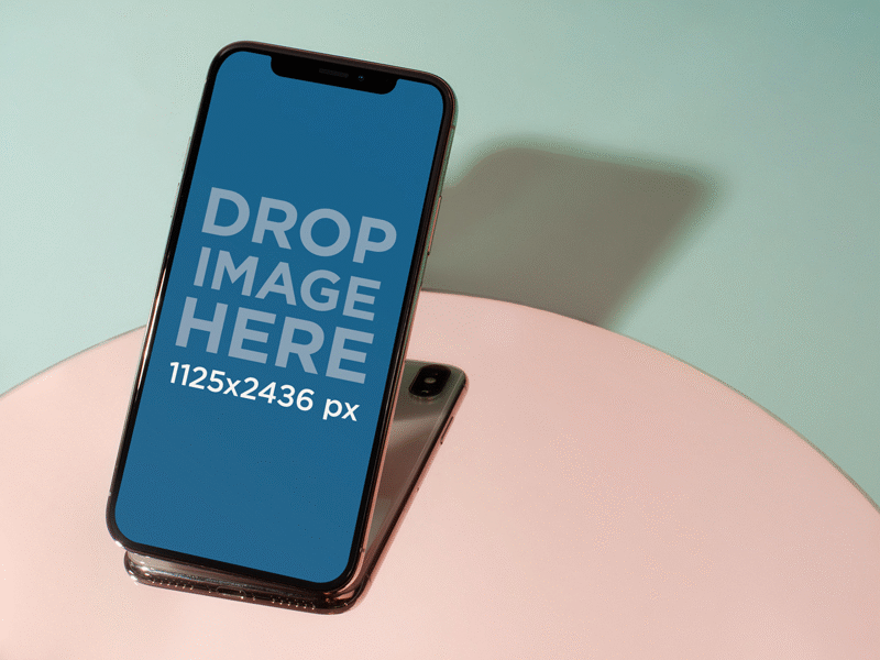 Creative Shot Of An Iphone X Mockup On A Pink And Aqua Surface design template digital marketing iphone iphone mockup iphone x ui ux