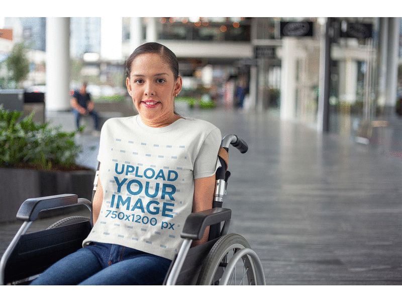 Mockup of a Girl Using a Wheelchair and Wearing a T-Shirt