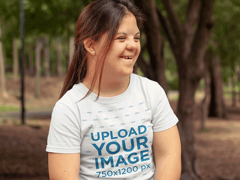 T-Shirt Mockup of a Smiling Woman at a Park