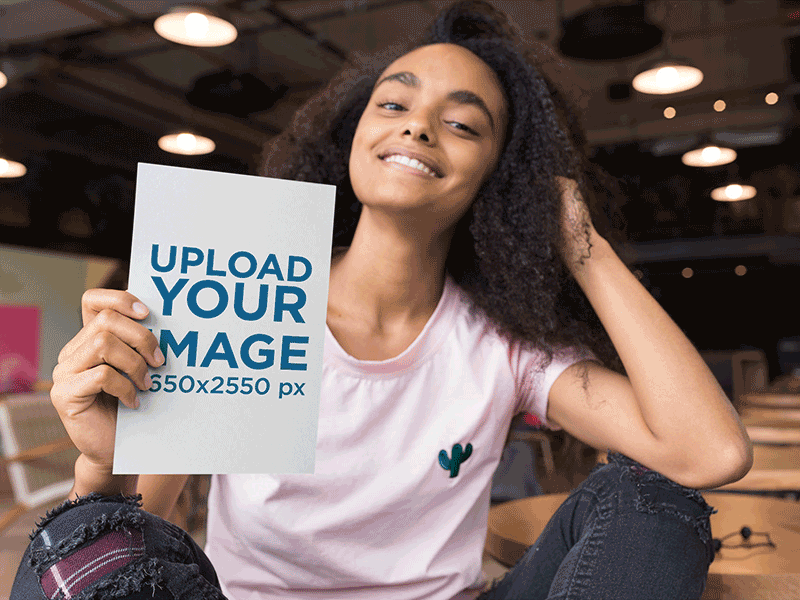 Mockup of a Smiling Girl Holding a Flyer branding design templates mockup online flyer maker