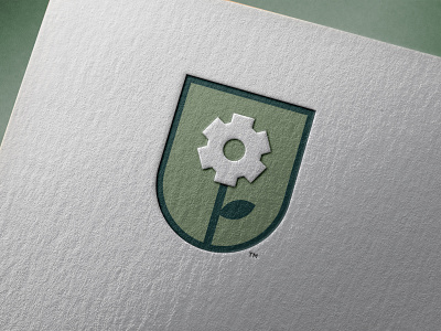 Mechanical Lily Munitions - Printed Logo badge hunting badgedesign cleverlogo cog wheel flower illustration green branding gun control lily logo designer logomark smart mark trademark