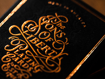 Sons of Liberty Playing Cards tuckcase gold foil hand lettering illustration letterpress playing cards script sons of liberty typography vintage woodcut