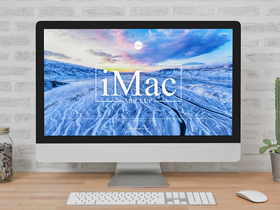 Free iMac Placing on Wooden Table Mockup