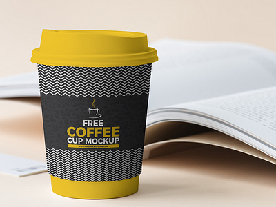 Free Coffee Cup Beside Book Mockup 2018