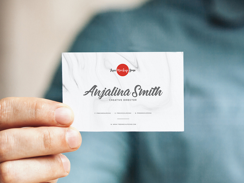 Free Man Holding In Hand Business Card Mockup by Free