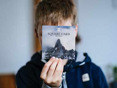 Free Little Boy Showing Square Card Mockup PSD