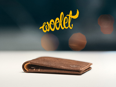 Woolet smart wallet - Logo and product bluetooth hand ibeacon leather lettering logo product design wallet woolet yellow
