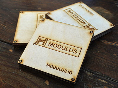 Modulus Tangrams engraving logo modulus node.js promotion puzzle sxsw tangram wood