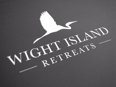 Wight Island Retreats branding egret logo
