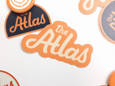 The Atlas merch atlas branding coffee shop merchandise stickers