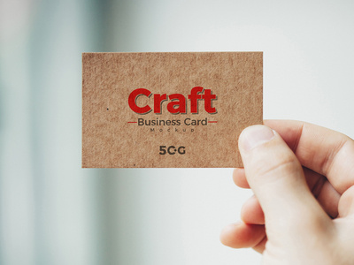Free Man Holding Craft Business Card Mockup Psd 2018