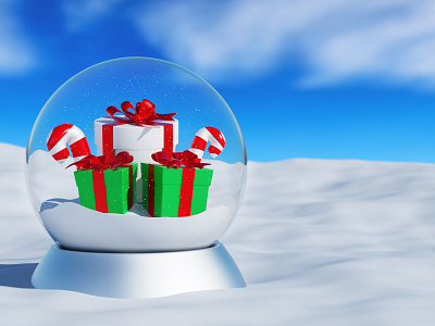 Christmas snow globe with Christmas presents and lollipop