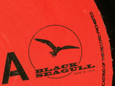 Side A black seagull label permanent press slab