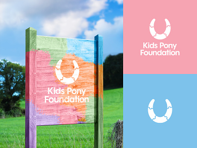 Kids Pony Foundation - Brand Design autsim brand identity branding clean colour design jig saw logo minimal minimalist pieces pony puzzle puzzle piece sign sign post special needs typography wood wooden sign