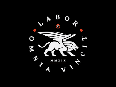 Labor Omnia Vincit Badge.