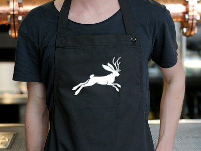 Hop Factory Apron animal apron bar beer branding hospitality icon jackelope logo rabbit white