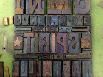 Typesetting hatch show print woodblock type lettering printmaking