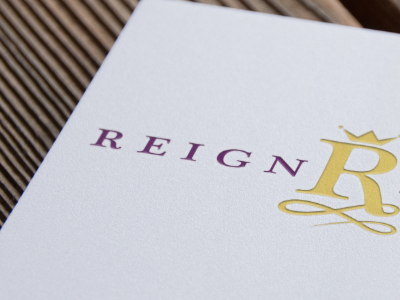 Reign Social Media gold logo purple social media marketing