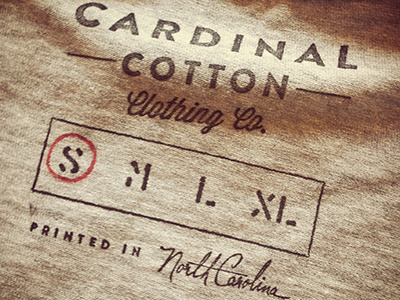 Cardinal Cotton inside tag stamp cardinal cotton clothing real world stamp texture vintage yeah i took a tilted photo
