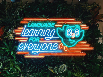 Duolingo Neon hand lettering neon sign owl plant wall