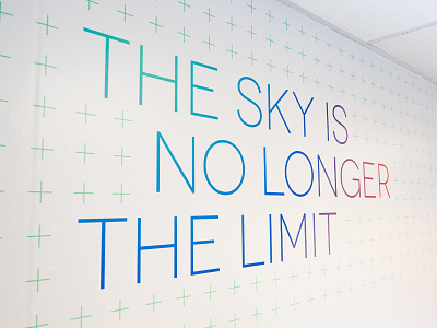 The sky is no longer the limit wall graphic art brand branding college colour decal design education gradient graphic interior logo mural school training university wall wallpaper wayfinding