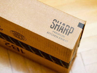 Sharp Logo #ThirtyLogos box logo parcel sharp typography