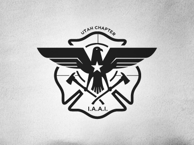 IAAI Mark axe eagle emblem firefighter