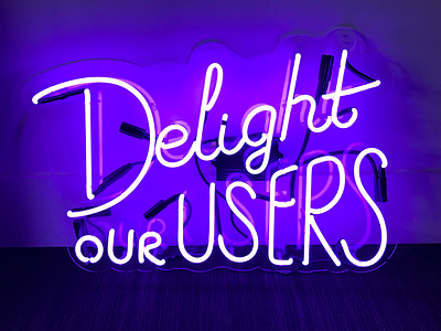 Delight our users handlettering neon start up tech