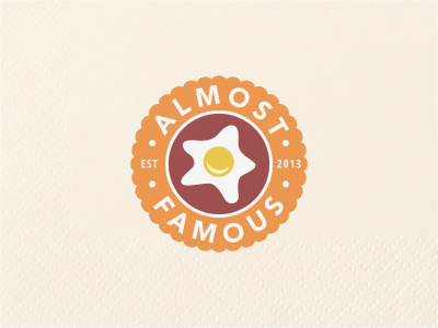 Almost Famous circular crest egg emblem food health logo nature orange red restaurant yolk